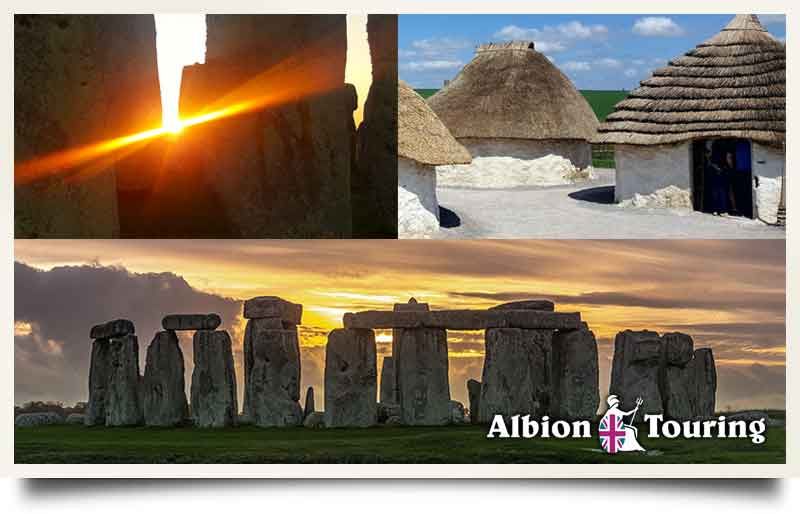 In silhouette with sun shining through stones, thatch roof Bronze Age huts and the stones at sunset.