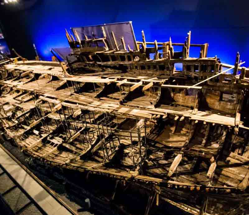 The ship's wooden structure in situ within the museum.