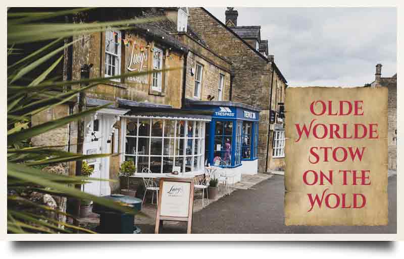 Quaint stone-built cottage shops with caption 'Olde Worlde Stow on the Wold'.