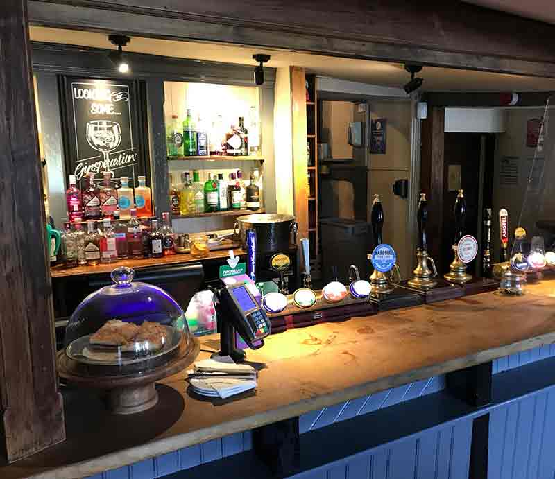 The bar with beer pumps and spirits.