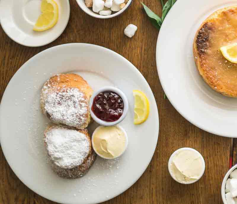 Plates of appetising cakes and buns.