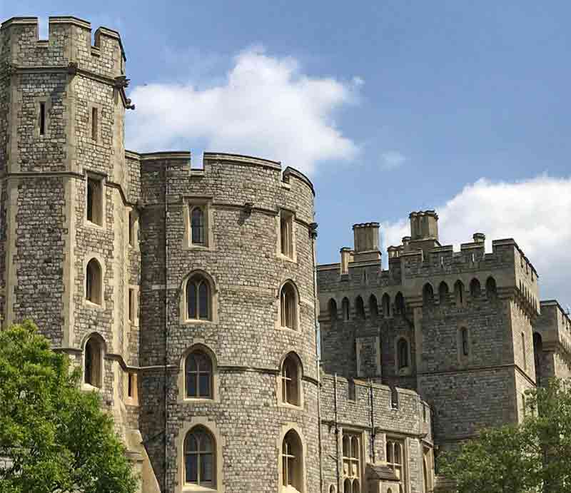 Exterior view of round towers and battlements.